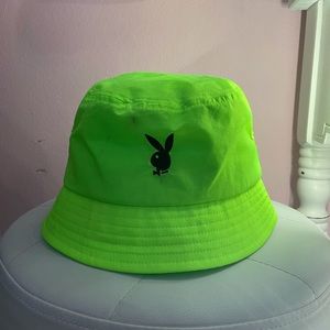 a neon green playboy bucket hat